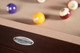 Detailed shot of the modern maple construction and refined nutmeg finish of the Zoey Slate Pool Table. Detailed shot of the modern maple construction and refined nutmeg finish of the Zoey Slate Pool Table.